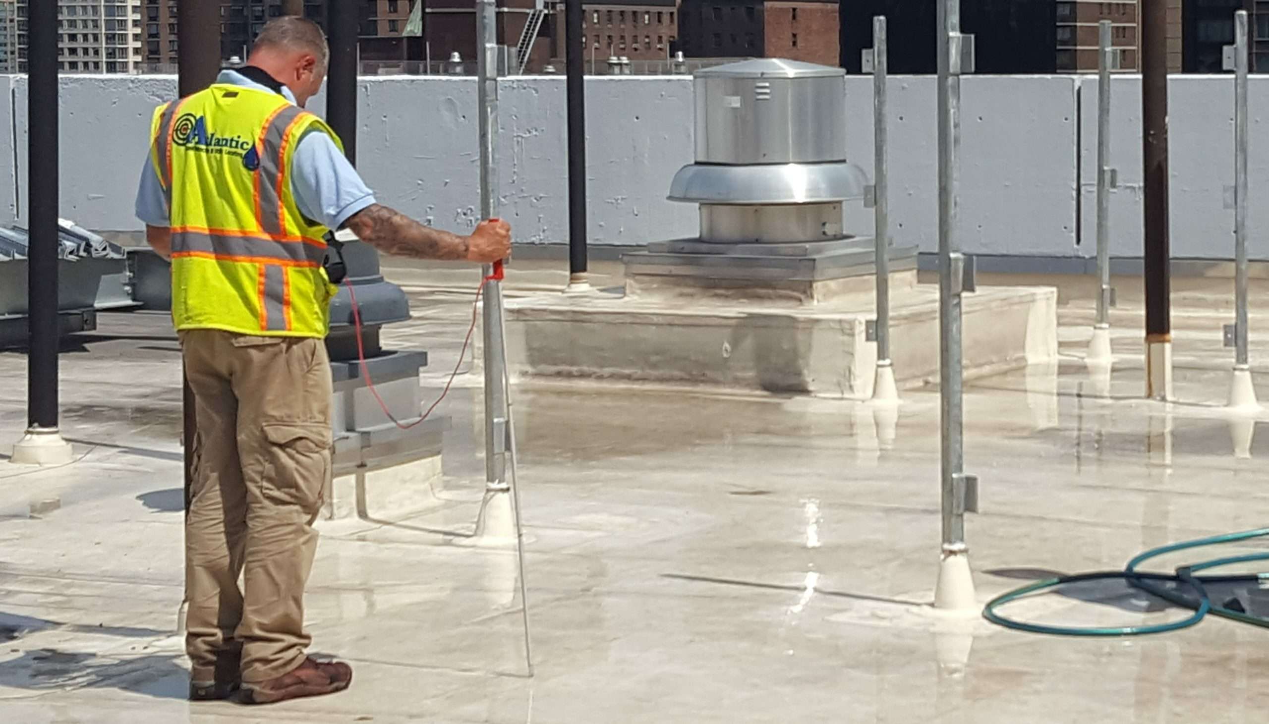 Technician running a low-voltage vector mapping scan on an exposed membrane
